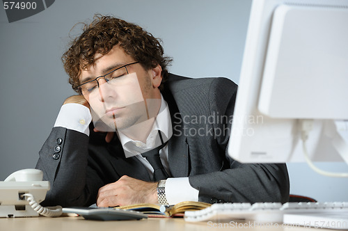 Image of overworked businessman