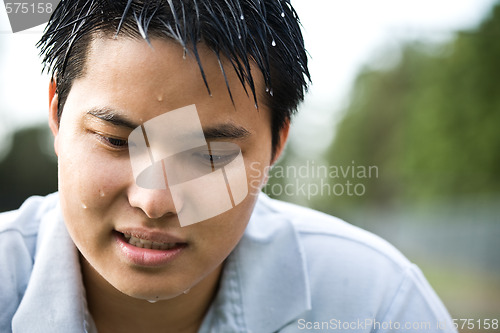 Image of Sad depressed asian man