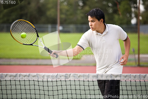 Image of Asian tennis player