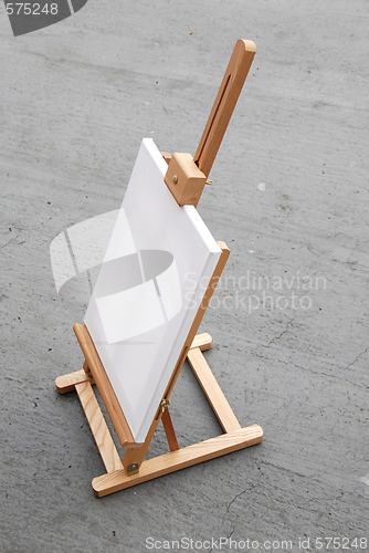 Image of Easel with blank canvas