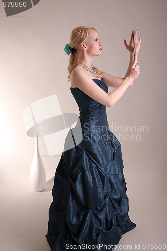 Image of Young woman with prom dress