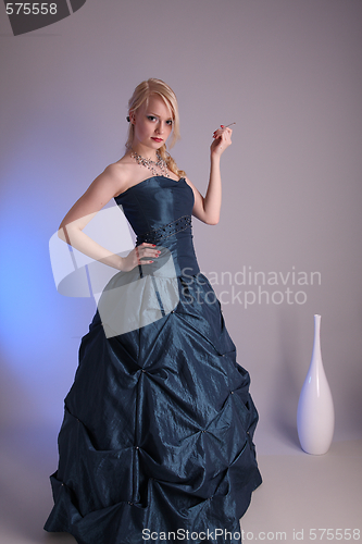 Image of Young woman with prom dress