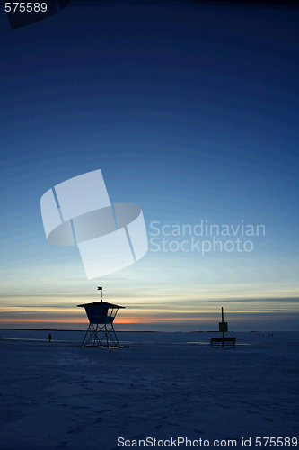 Image of Sunset over frozen lake