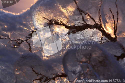 Image of Sunset over frozen lake