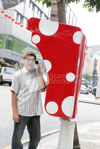 Image of Man on phone