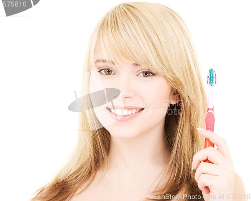 Image of happy girl with toothbrush