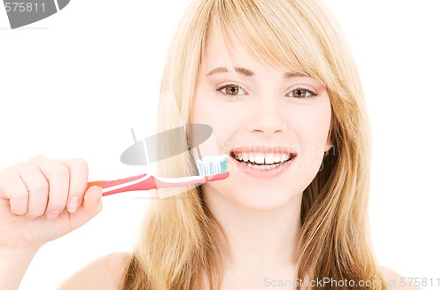 Image of happy girl with toothbrush