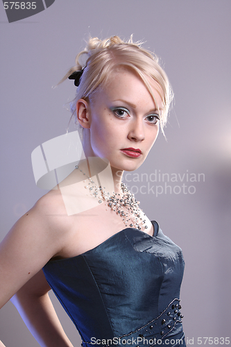 Image of Young woman with prom dress