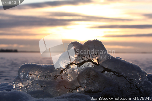 Image of Sunset over frozen lake