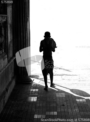 Image of SILHOUETTE OF YOUNG BOY