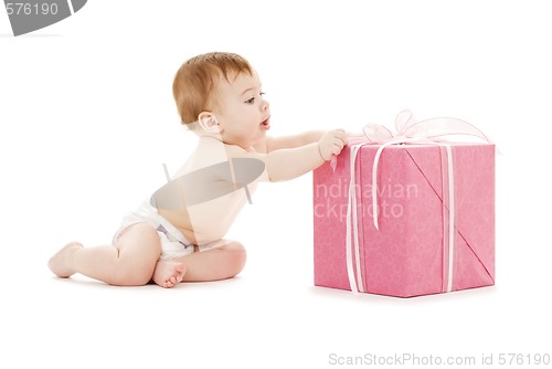 Image of baby boy with big gift box