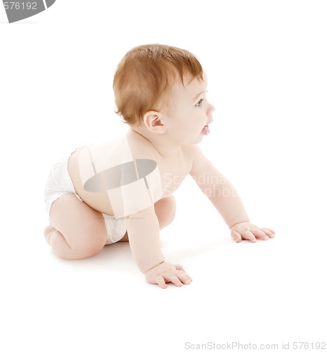 Image of crawling baby boy in diaper