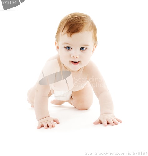 Image of crawling baby boy in diaper