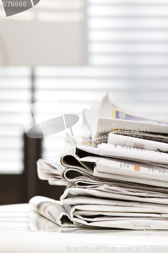 Image of pile of newspapers