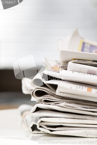 Image of pile of newspapers