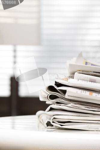 Image of pile of newspapers