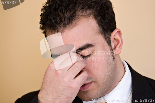 Image of Man With a Headache