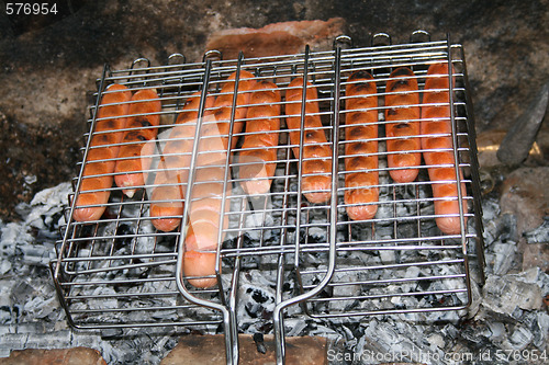 Image of grill with sausage
