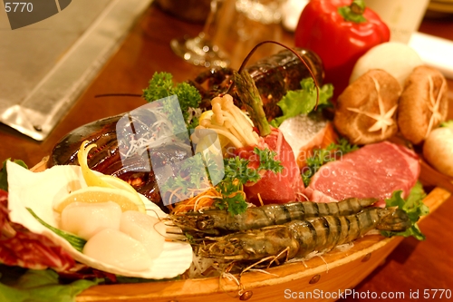 Image of Boat sushi with an assortment of delicacies.