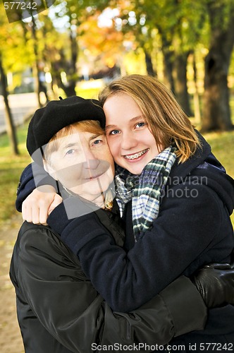 Image of Granddaughter hugging grandmother