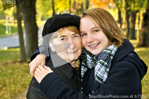 Image of Granddaughter hugging grandmother