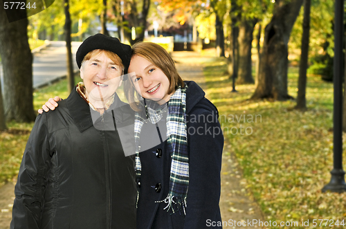 Image of Granddaughter walking with grandmother