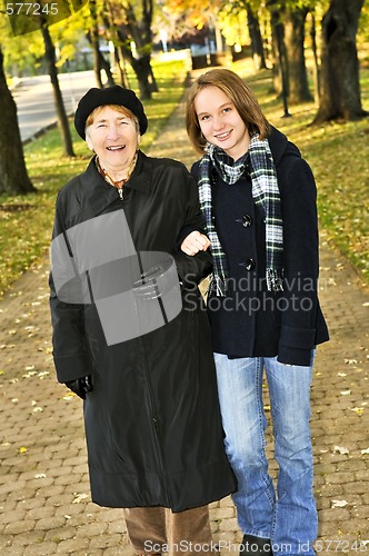 Image of Granddaughter walking with grandmother