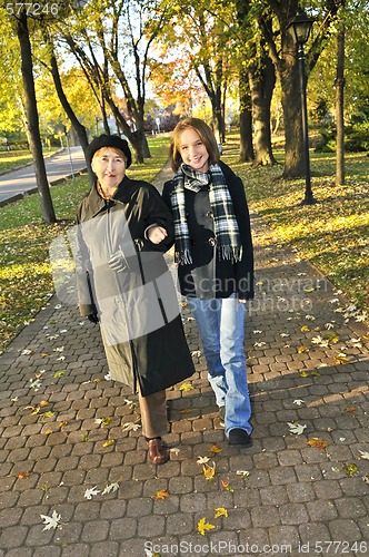 Image of Granddaughter walking with grandmother