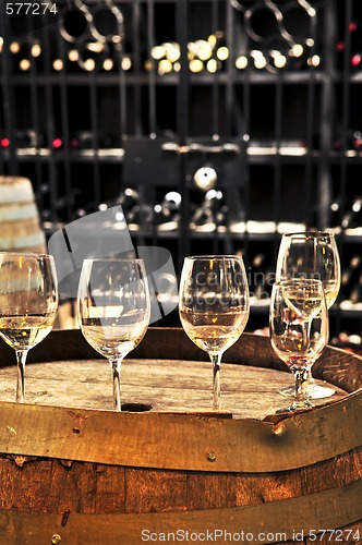 Image of Wine  glasses and barrels