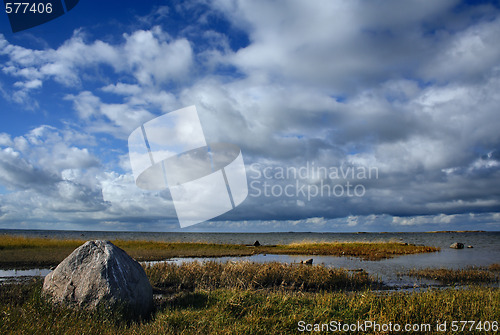 Image of The big stone against clouds