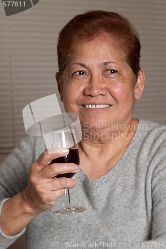 Image of Having a glass of wine