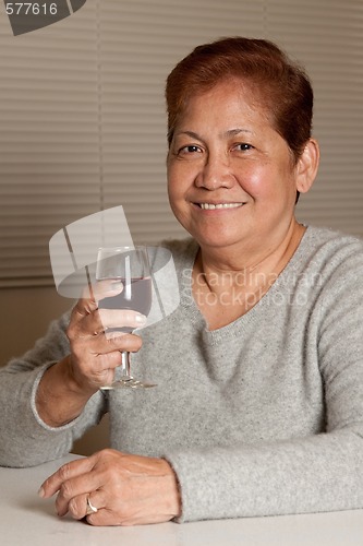 Image of Senior have wine