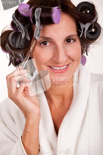 Image of Woman in rollers