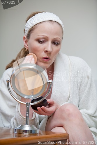 Image of Woman getting ready