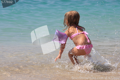 Image of Young girl in the sea