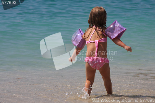 Image of Young girl in the sea