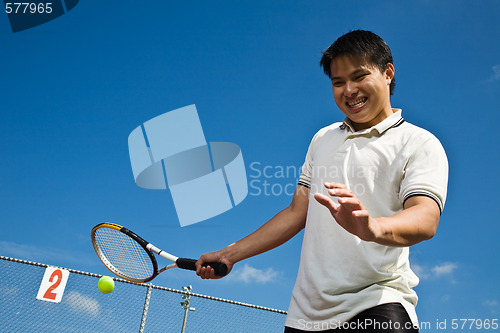 Image of Asian tennis player