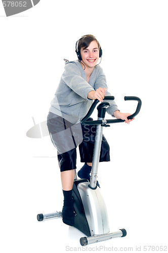 Image of Young boy doing fitness