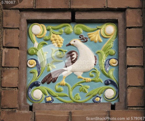 Image of Bird on Relief Ceramic Tile.