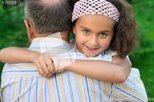 Image of Kid and grandfather outdoors