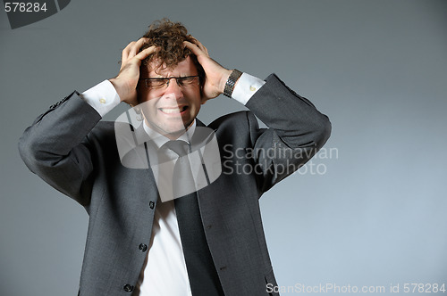 Image of Stressed businessman