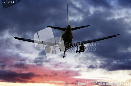 Image of   Plane passes overhead