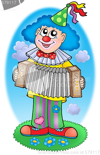 Image of Clown with accordion on  meadow
