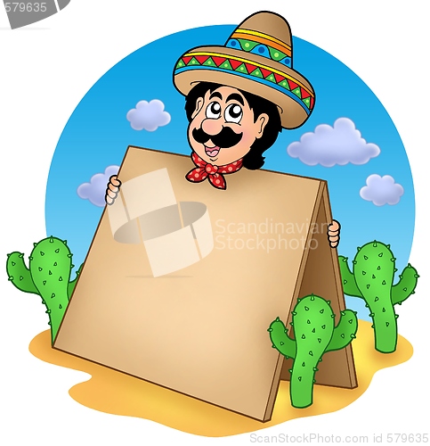 Image of Mexican man with table in desert