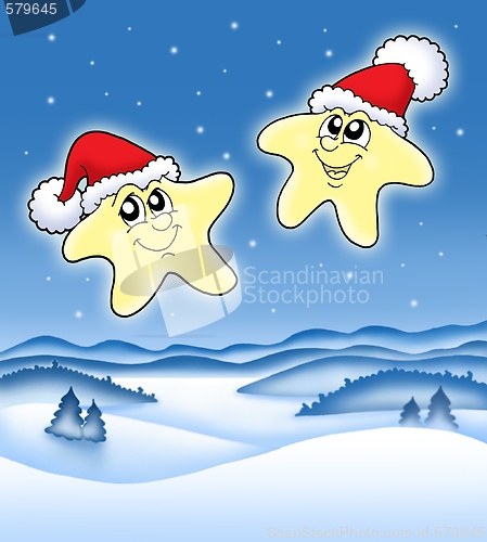 Image of Christmas stars on starry sky