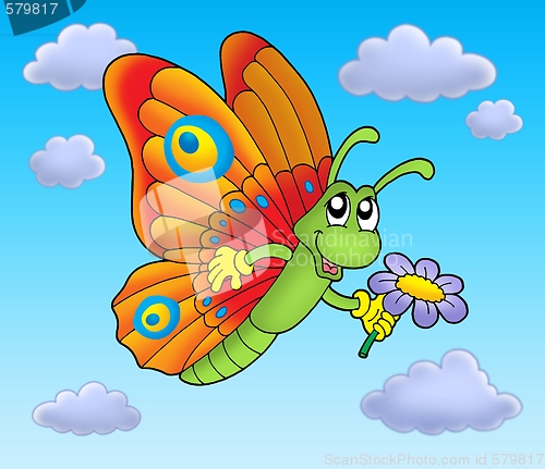 Image of Butterfly with flower on blue sky