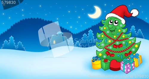 Image of Christmas card with Santa tree and gift