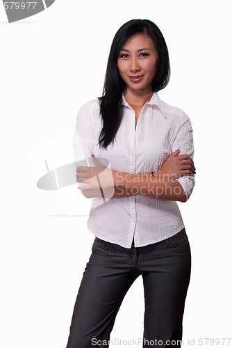 Image of Smiling woman with crossed arms
