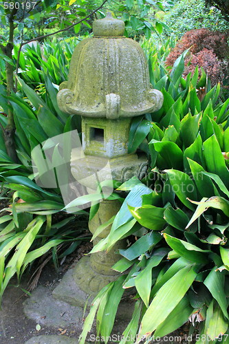 Image of Japanese Statue in a Garden