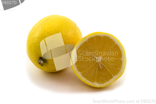 Image of Two lemons isolated on white